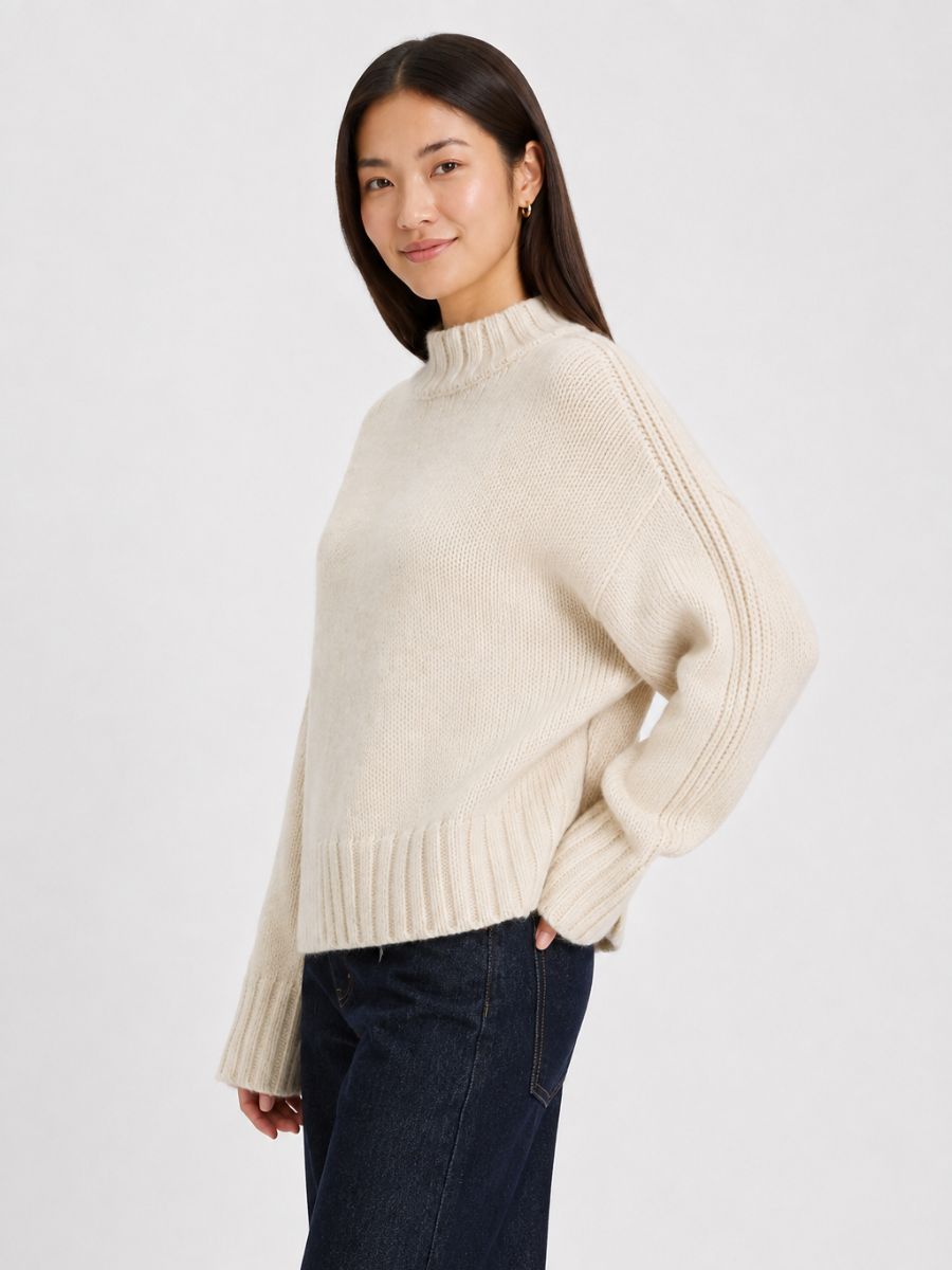 Dyna Mockneck Chunky Sweater by Chantex in cream worn by model