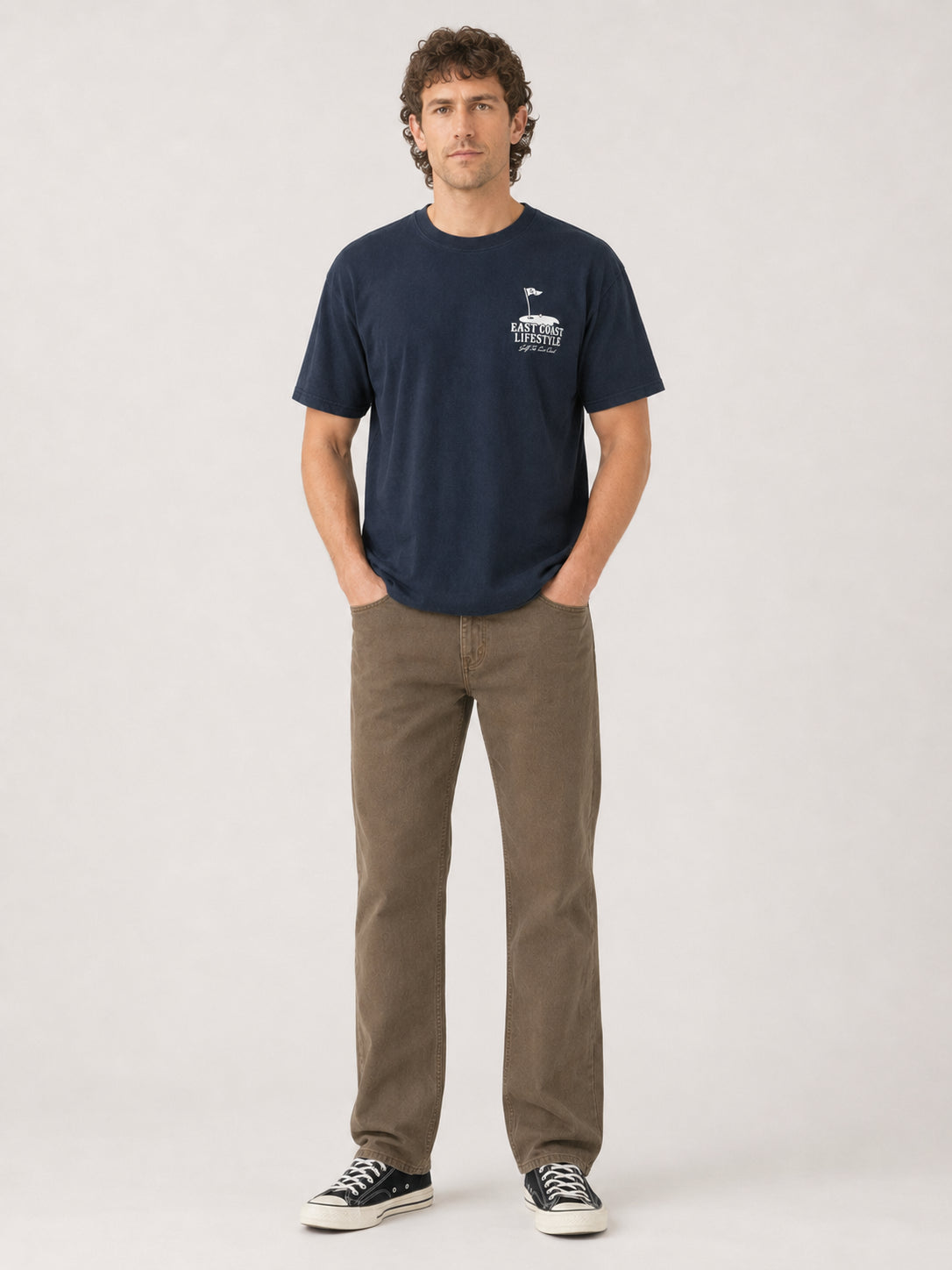 Model wearing East Coast Lifestyle Course List Tee from East Coast Lifestyle in navy