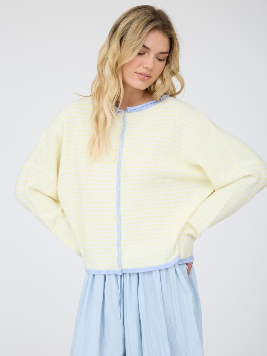 Button-Up Oversized Long Sleeve Sweater by Mine modeled in pale yellow stripes
