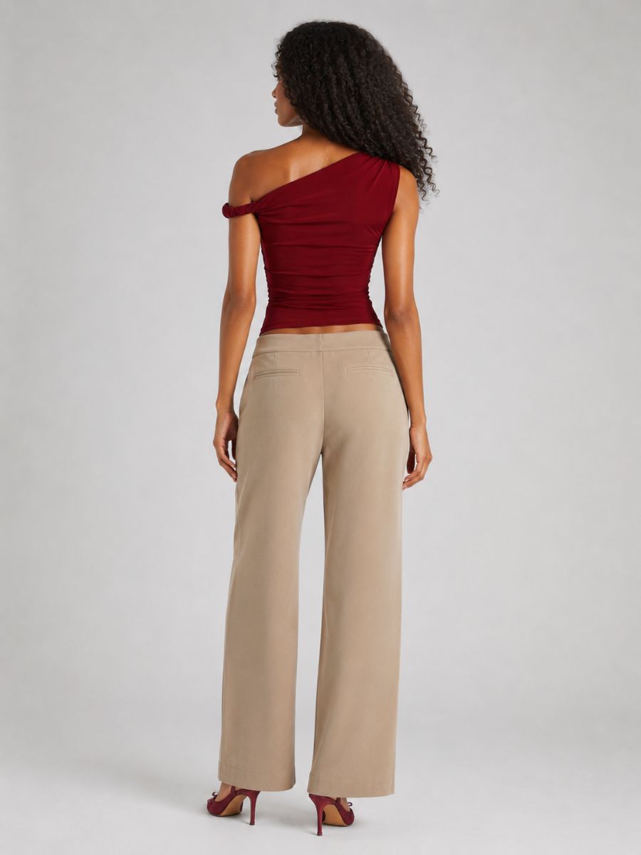 Pseudio Veda Twist Shoulder Top in burgundy viewed from back on female model