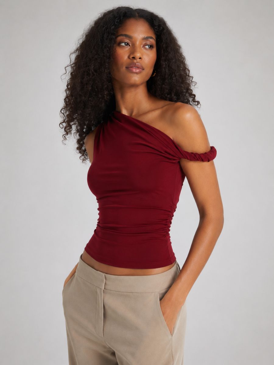 Pseudio Veda Twist Shoulder Top in burgundy worn by female model
